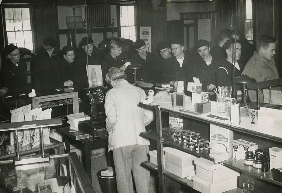 Cadets browse merchandise at campus store in East Hall, 1945
