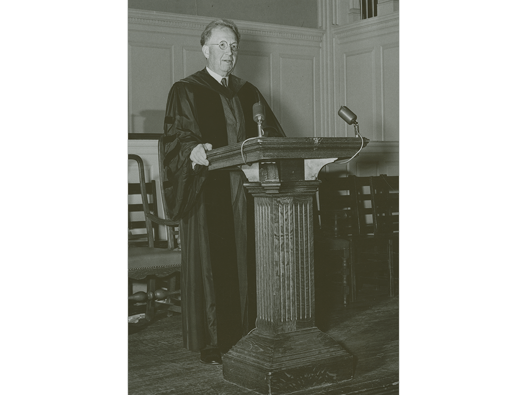 Fosdick, older, in robe at podium
