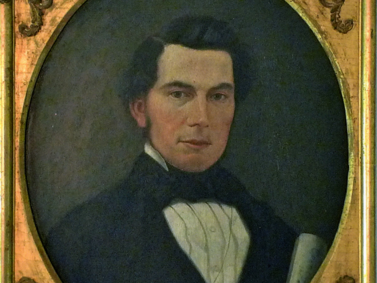 A framed portrait of George Gavin Ritchie