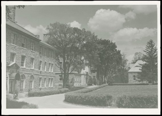 An archival image of the Academic Quad, with Lawrence Hall, Lathrop Hall, and Hascall Hall visible