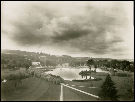 Archival image of Colgate's lower campus, with Willow Path in the foreground, and Taylor Lake in the background.