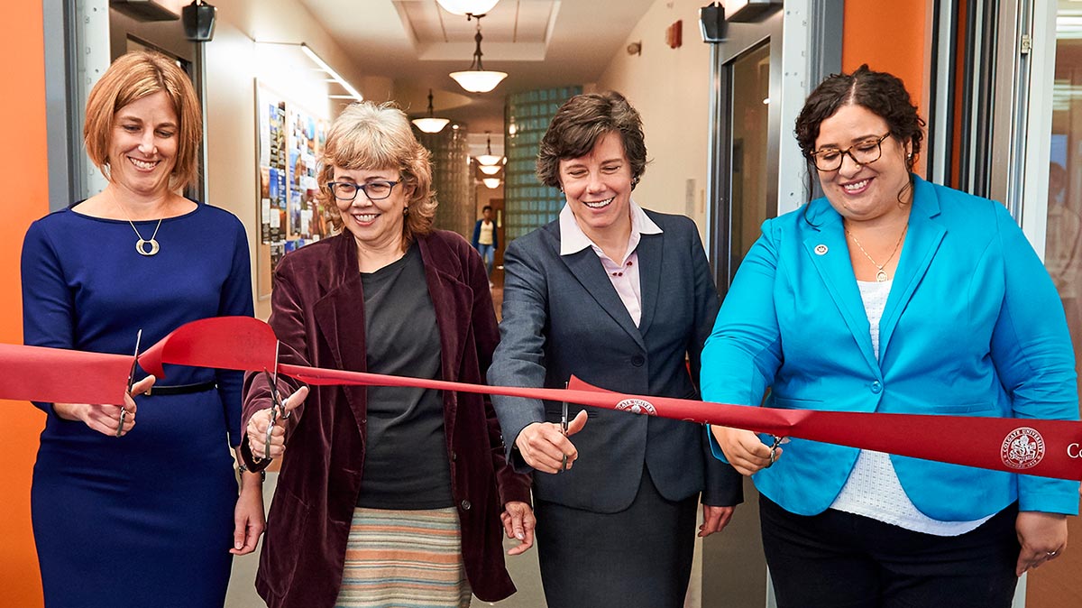 Nicole Simpson, Jill Harsin, Connie Harsh, and Christina Khan cut the ribbon opening the Center for International Programs